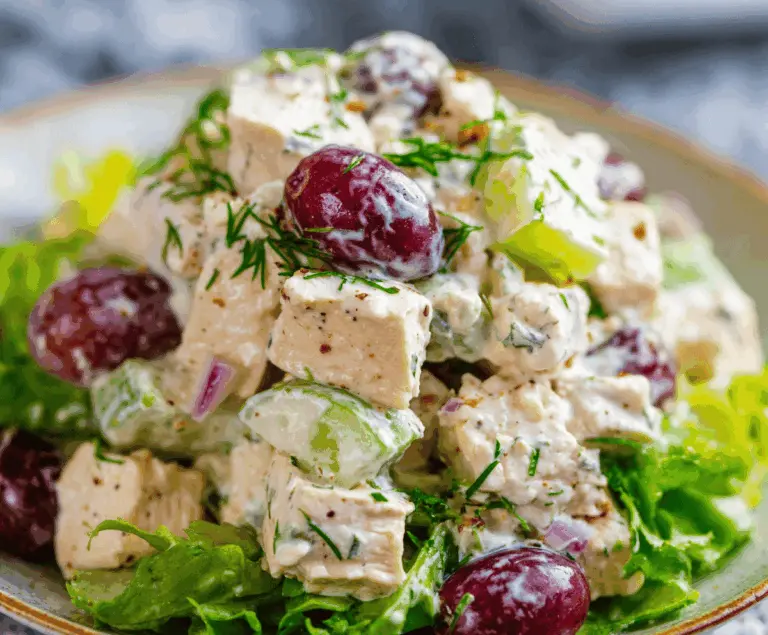 Healthy chicken salad with Greek yogurt, fresh vegetables, and herbs in a bowl for a nutritious meal option