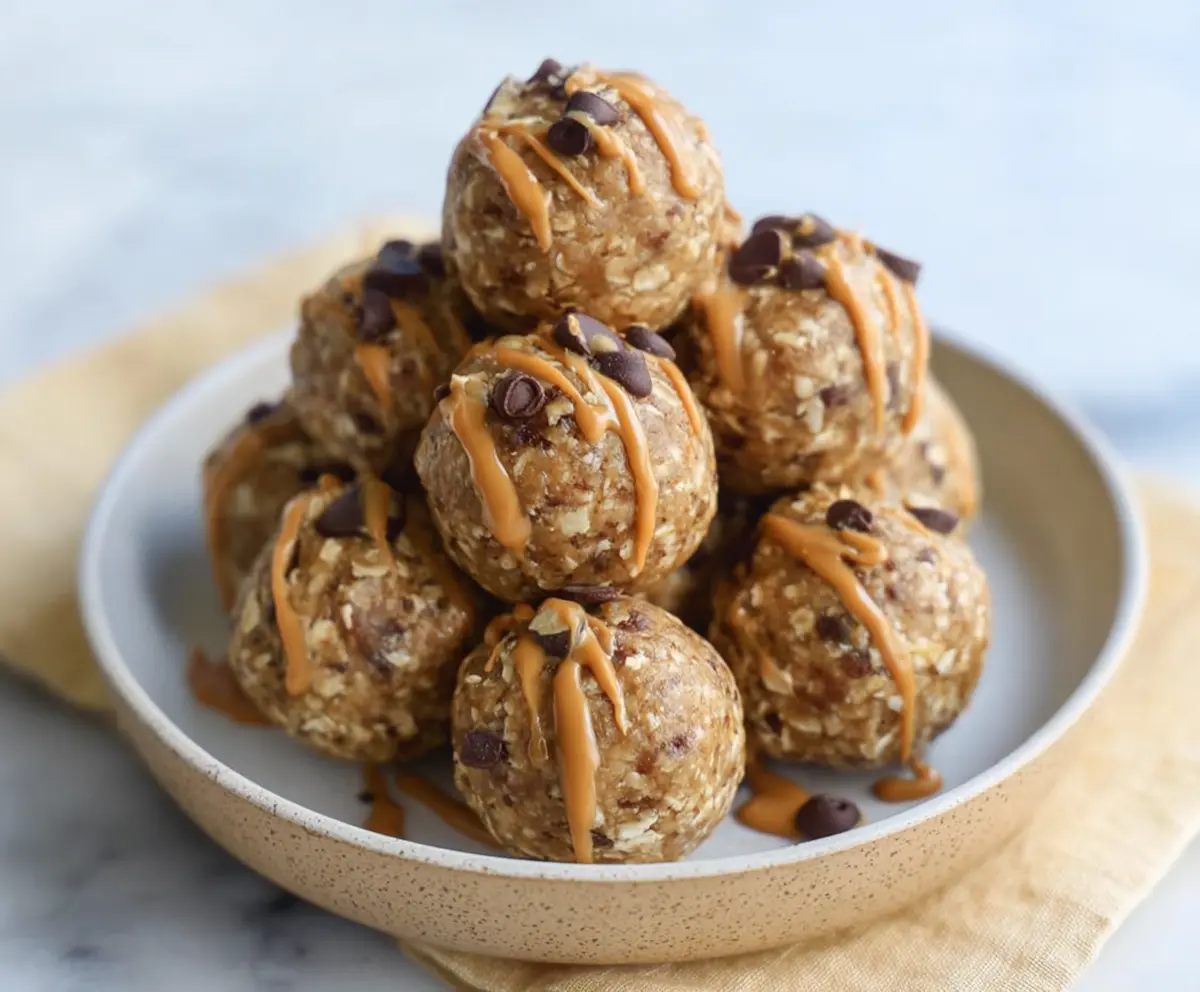 Delicious homemade peanut butter banana protein balls on a plate, healthy snack options for energy and fitness enthusiasts.
