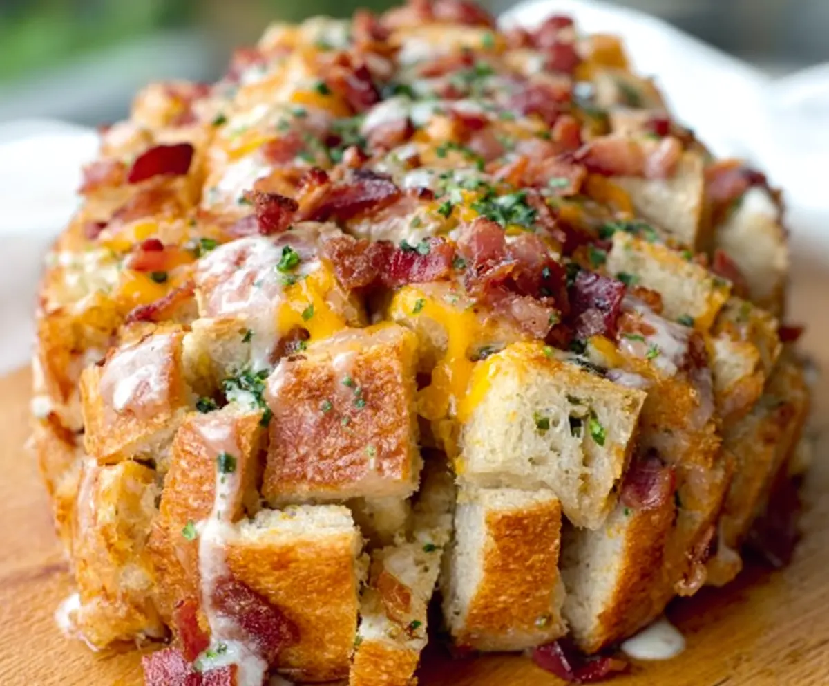 Delicious Cheesy Bacon Ranch Pull-Apart Bread with melted cheese and crispy bacon pieces