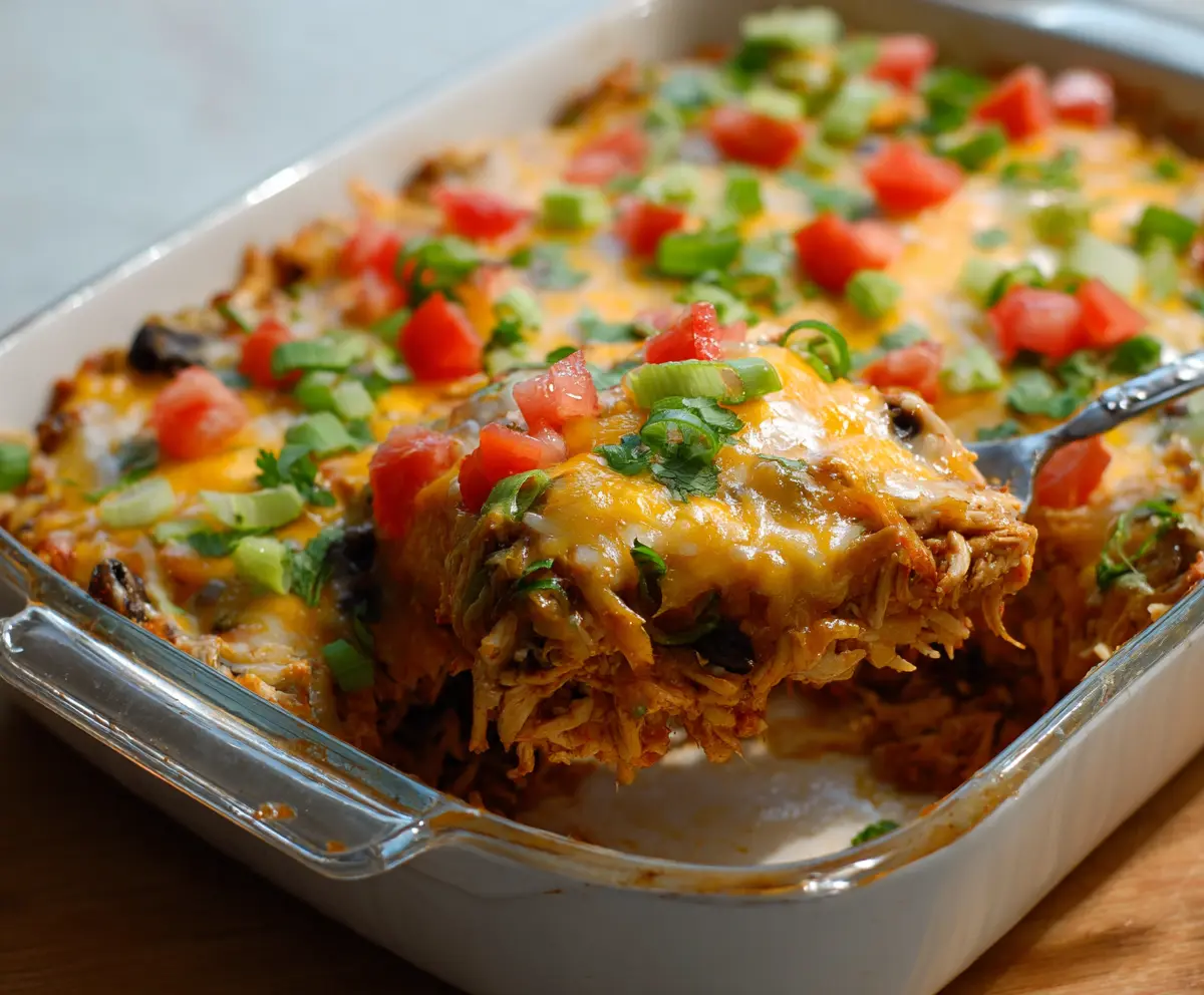 Healthy Chicken Taco Casserole dish with colorful vegetables and melted cheese, perfect for a nutritious Mexican-inspired meal.