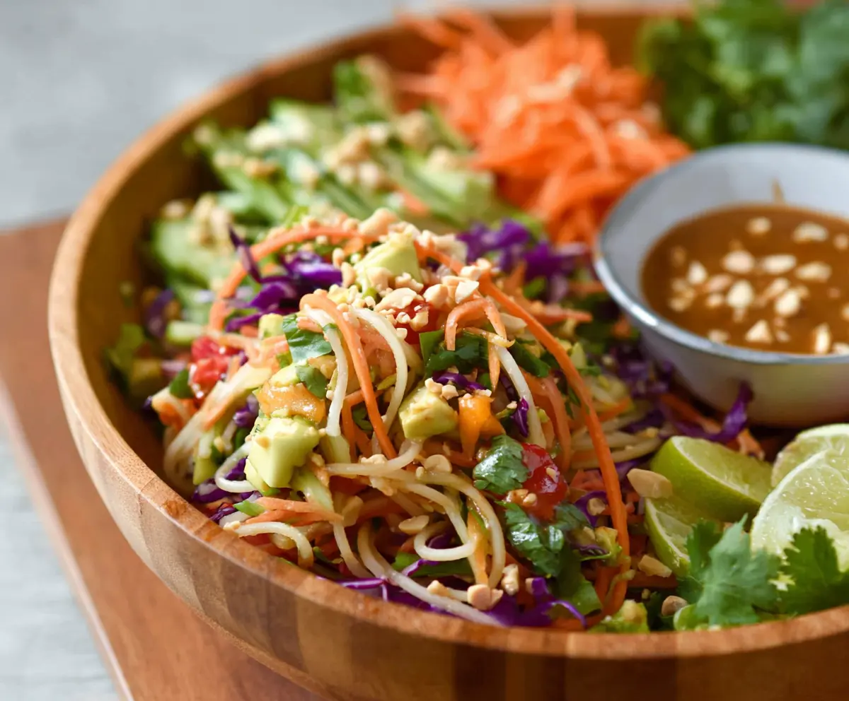 Fresh Spring Roll Salad with Peanut Dressing, vibrant vegetables and crunchy spring rolls.