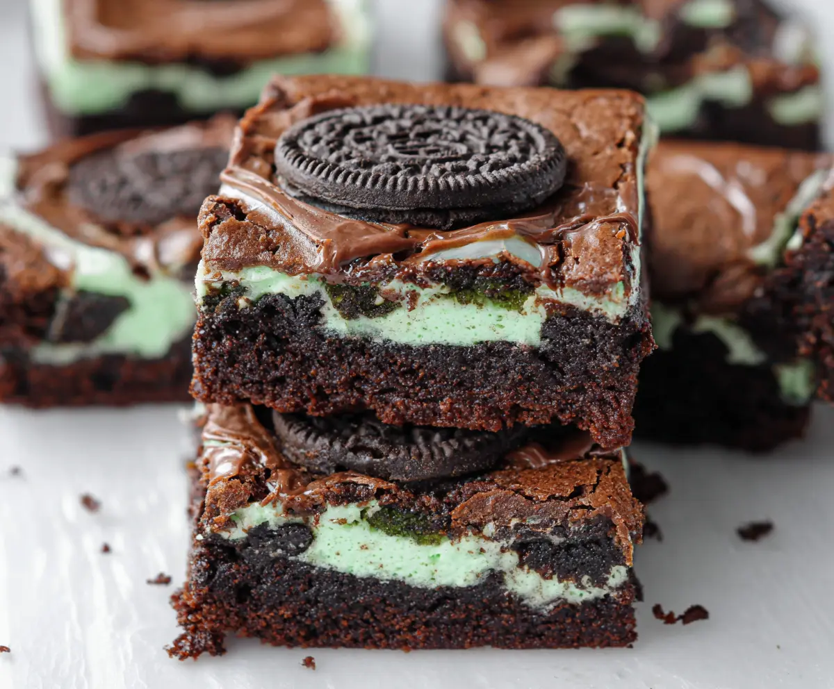 Delicious triple layer fudgy mint Oreo brownies with rich chocolate and refreshing mint flavor.